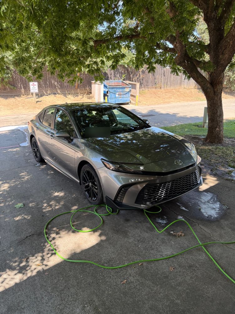 Toyota sedan clean and rinsed after the wash