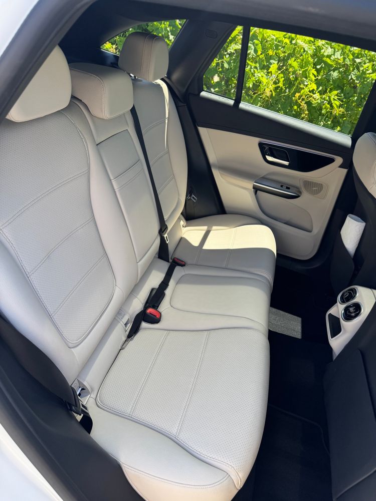 Clean cream leather rear seat in a Mercedes-Benz