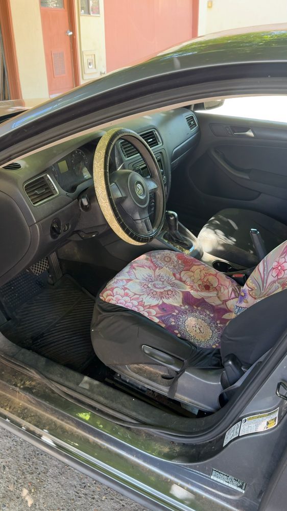 Dirty front interior of a Volkswagen before detailing